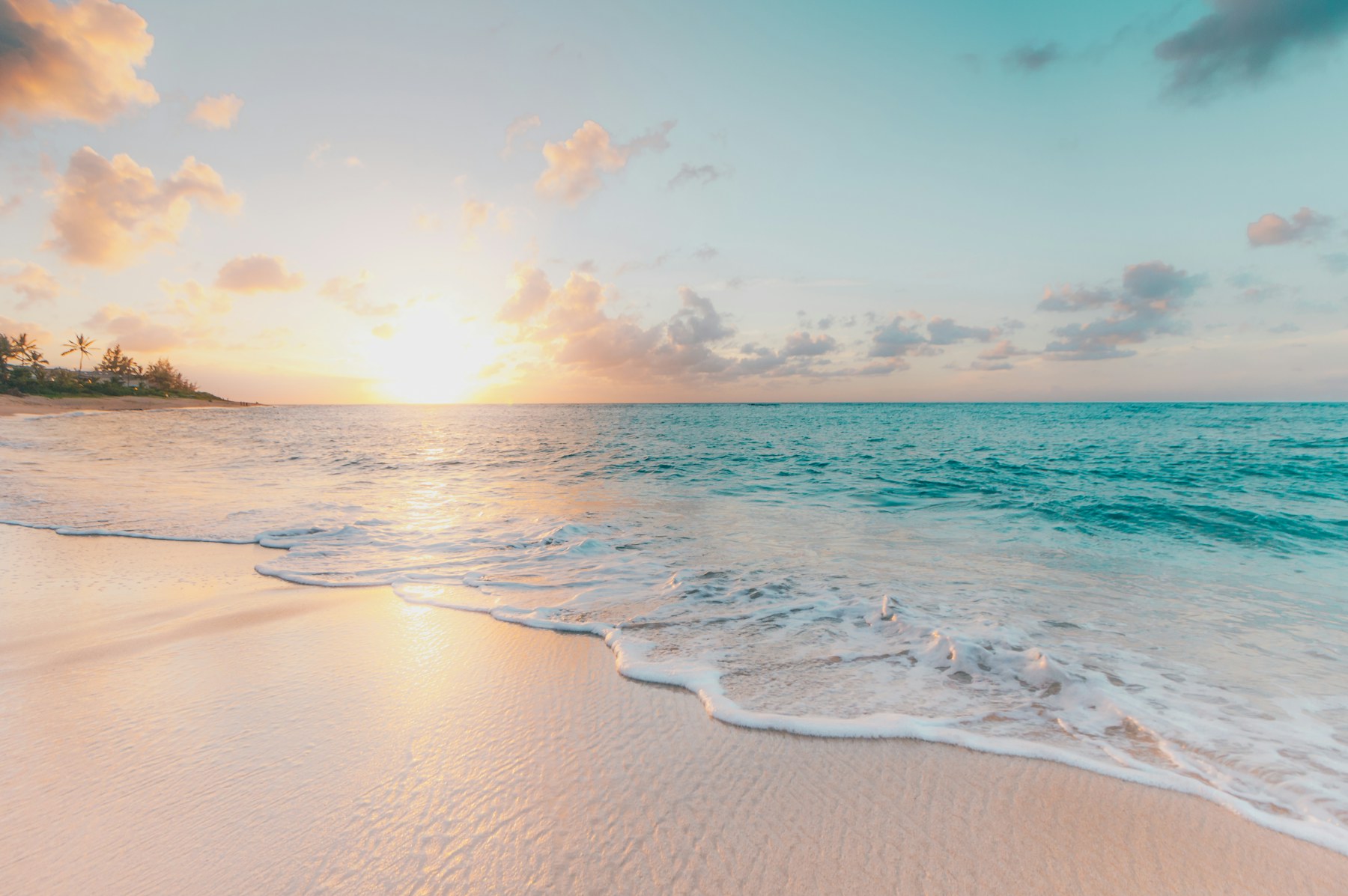 Quiet turquoise coastline at golden hour